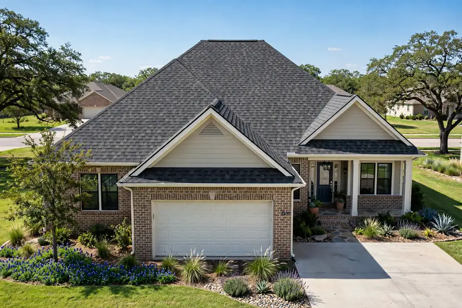 Asphalt shingle roof with new shingles after repair